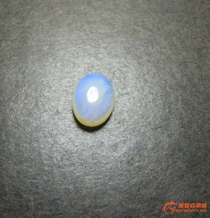 当年出口创汇时期的仿欧泊宝石琉璃椭圆大戒指