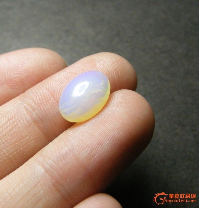 当年出口创汇时期的仿欧泊宝石琉璃椭圆大戒指